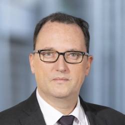 Jean-Luc Champy, White & Case.